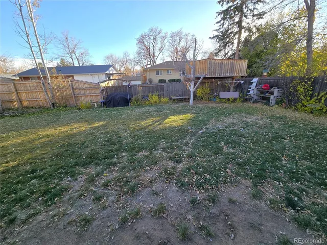 a view of yard with patio