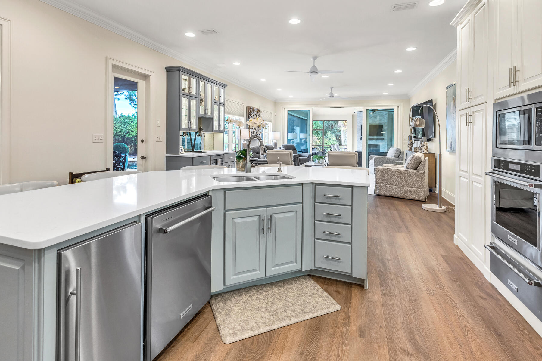 3435 Burnt Pine Lane Miramar Beach, FL 32550 - Photo 12 of 63 a kitchen with sink cabinets and wooden floor