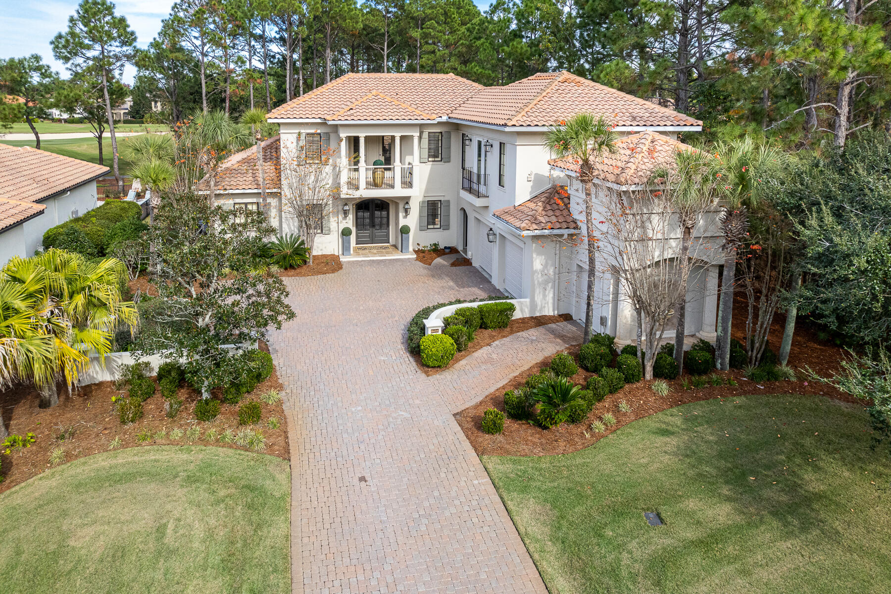 3435 Burnt Pine Lane Miramar Beach, FL 32550 - Photo 3 of 63 a front view of a house with yard and green space