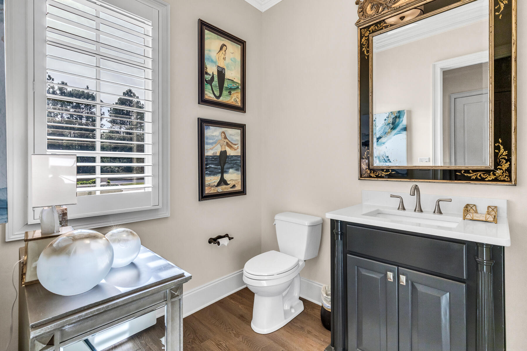 3435 Burnt Pine Lane Miramar Beach, FL 32550 - Photo 40 of 63 a bathroom with a toilet sink and mirror