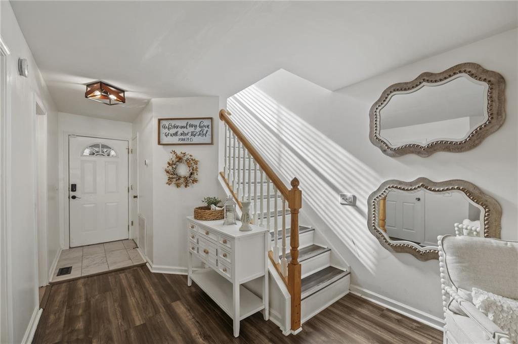 655 Riverside Drive Ellijay, GA 30540 - Photo 5 of 34 a view of entryway and hall with wooden floor