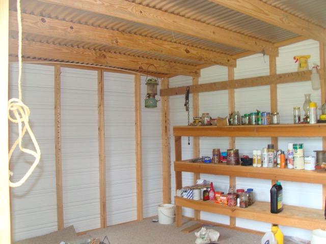 592 Mims Road DeFuniak Springs, FL 32433 - Photo 14 of 67 a shelf with books and knick knacks on it