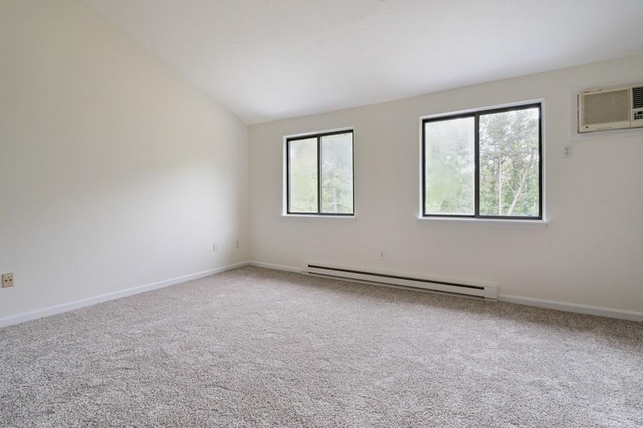 112 Chestnut Circle Brewster, MA 02631 - Photo 11 of 15 an empty room with windows