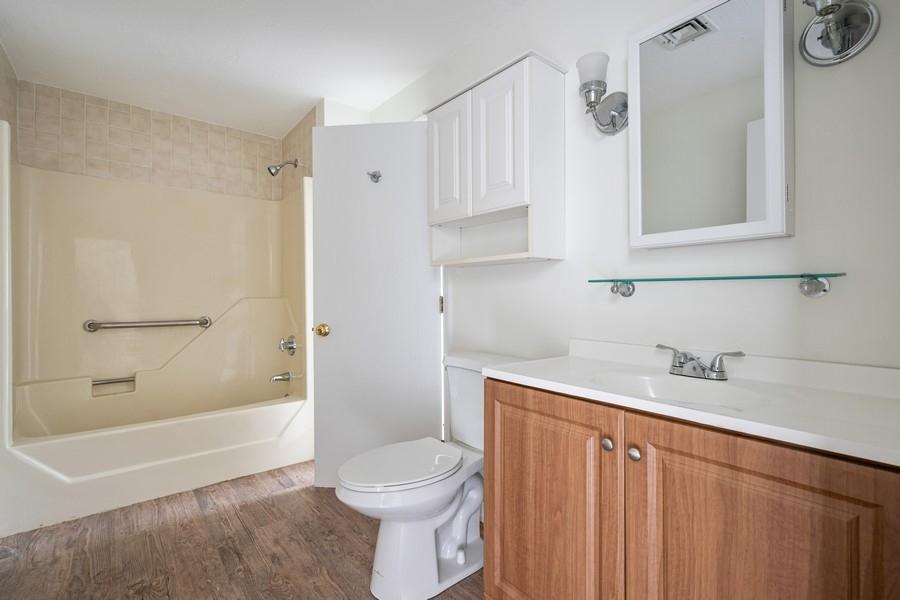 112 Chestnut Circle Brewster, MA 02631 - Photo 10 of 15 a bathroom with a sink a toilet and shower