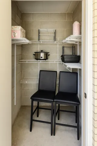 a kitchen with a sink and a refrigerator