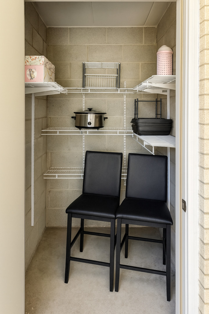 9250 Beloit Avenue, Unit 104 Bridgeview, IL 60455 - Photo 11 of 14 a kitchen with a sink and a refrigerator