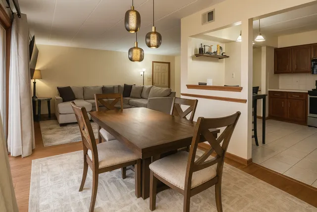 a view of a dining room with furniture