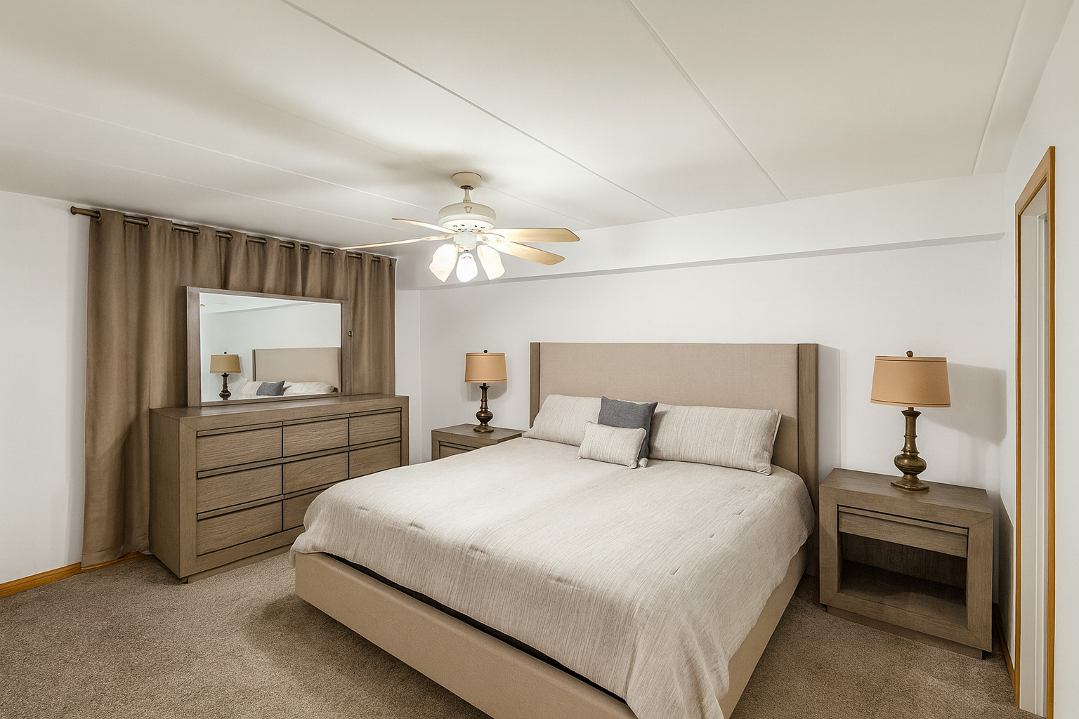 9250 Beloit Avenue, Unit 104 Bridgeview, IL 60455 - Photo 6 of 14 a bedroom with a bed and a chandelier