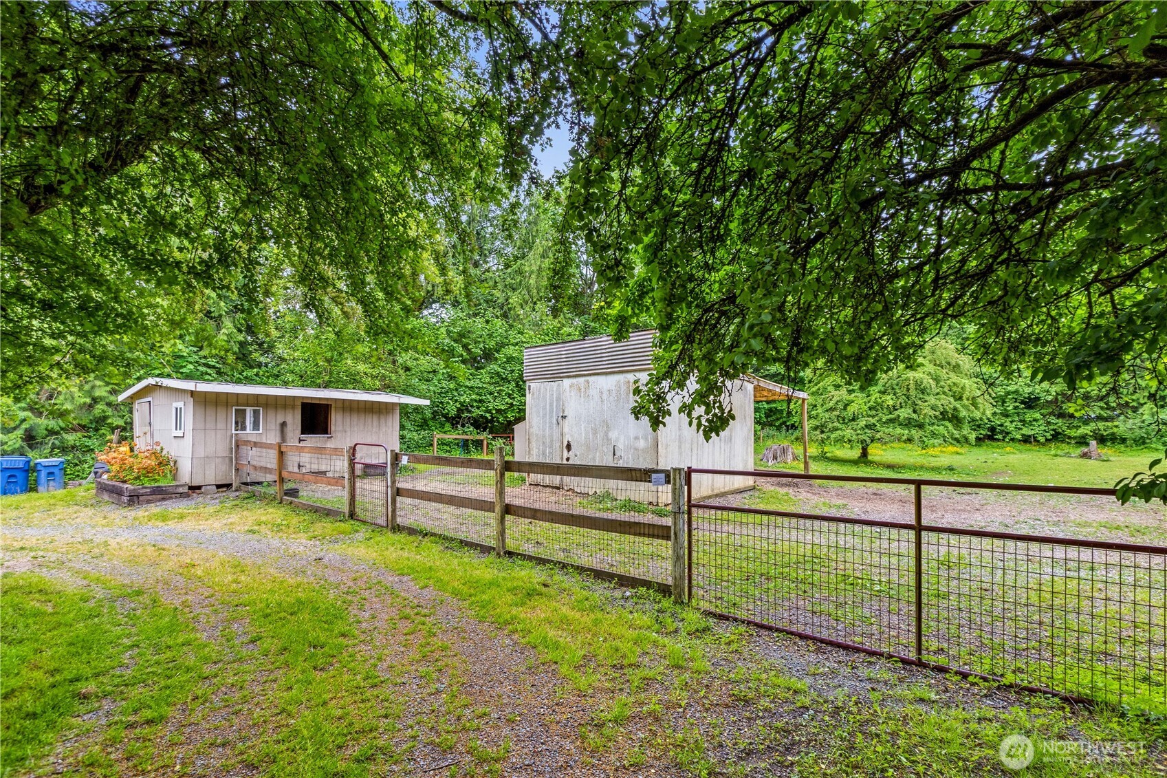 24522 Cromwell Road Monroe, WA 98272 - Photo 29 of 40 a view of a bench in a backyard