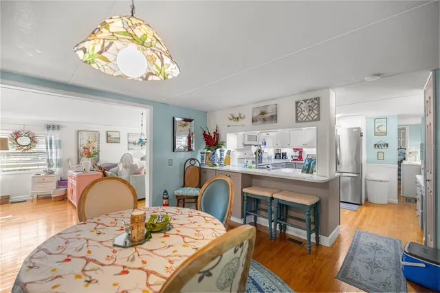 a view of a dining room with furniture