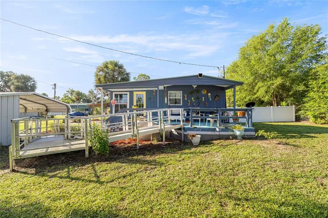 a front view of a house with swimming pool