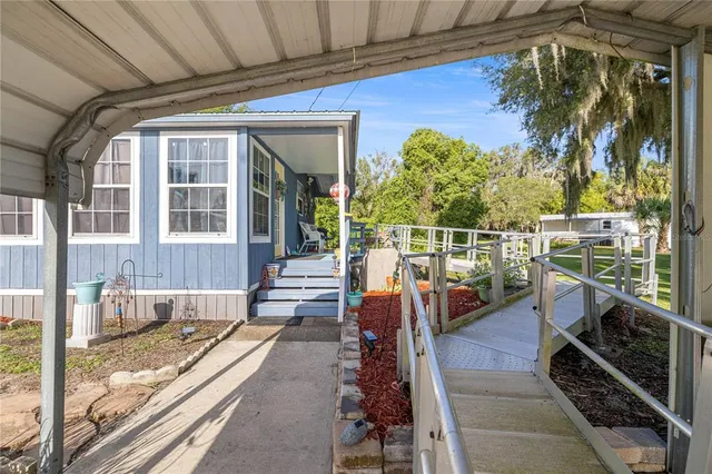 a view of a balcony with chairs