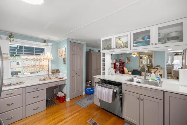 a view of a kitchen with cabinets