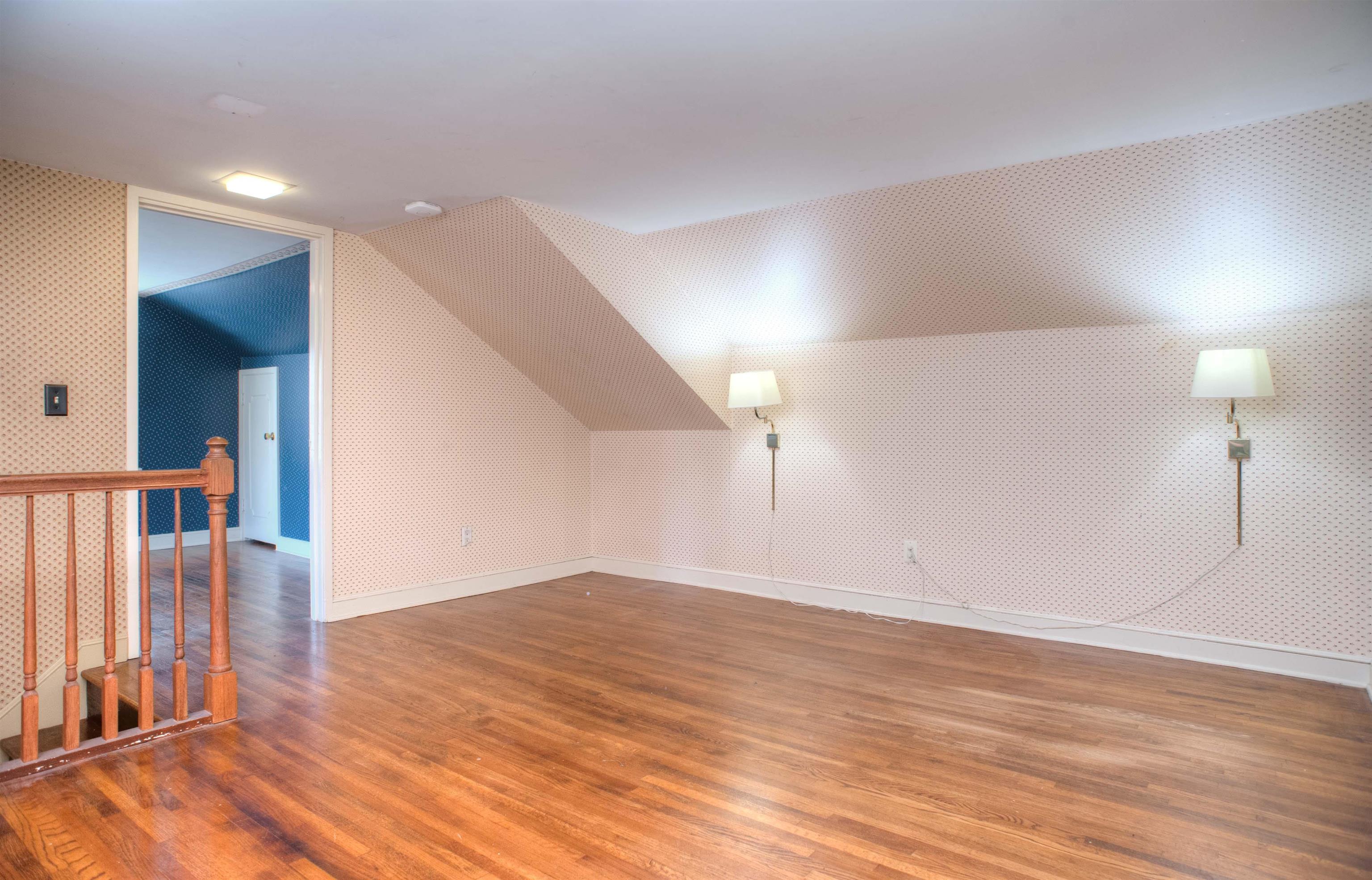 4756 Princeton Road Memphis, TN 38117 - Photo 16 of 22 a view of empty room with wooden floor