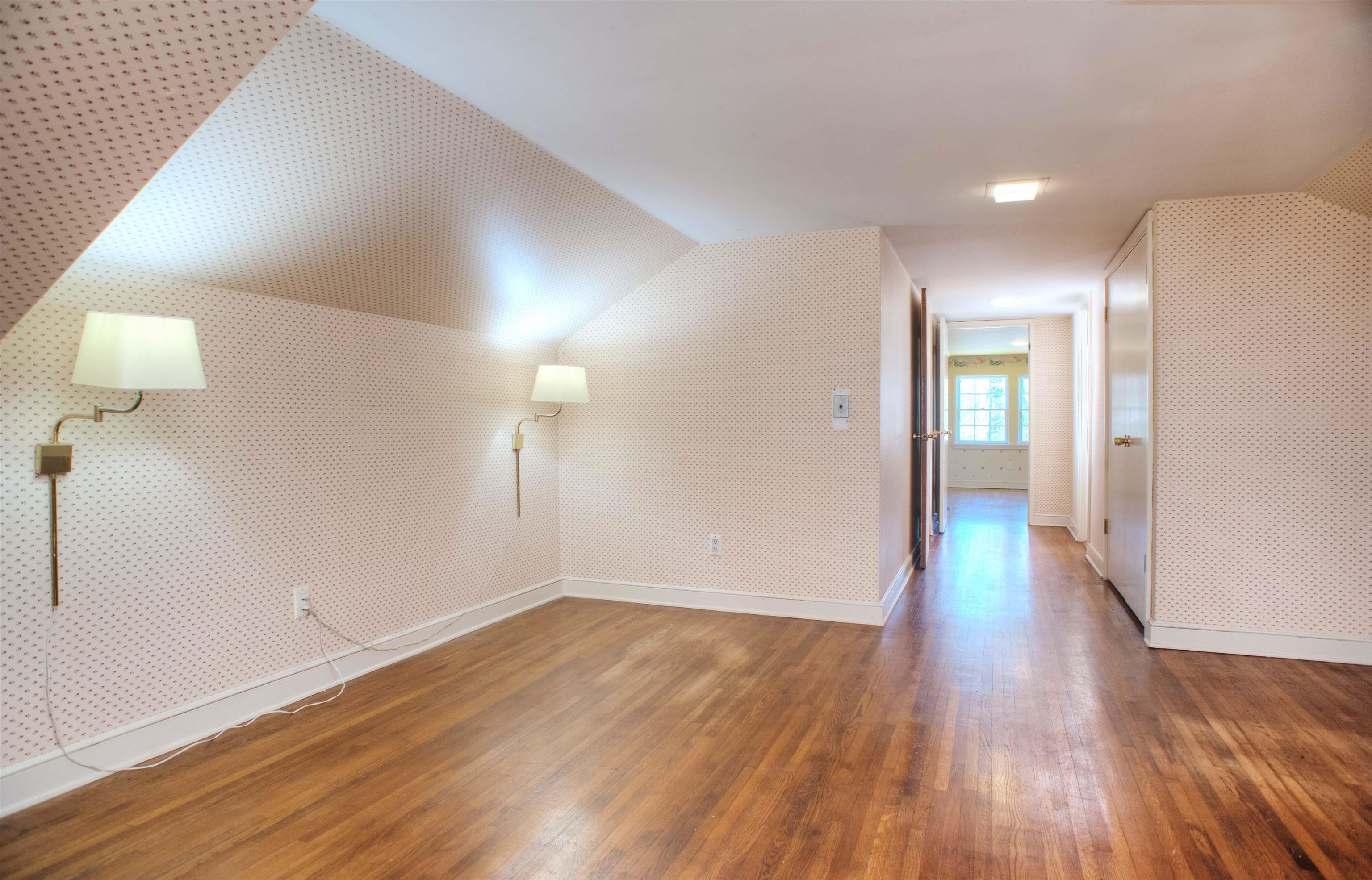 4756 Princeton Road Memphis, TN 38117 - Photo 17 of 22 a view of an empty room with wooden floor