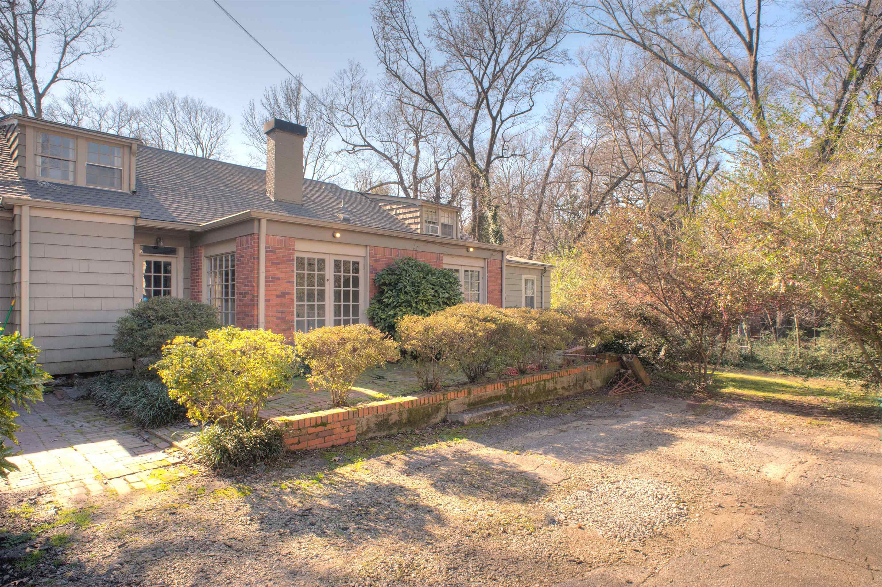 4756 Princeton Road Memphis, TN 38117 - Photo 22 of 22 a backyard of a house with outdoor seating