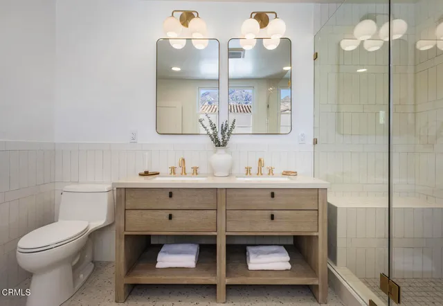 a backyard of a house with outdoor seating