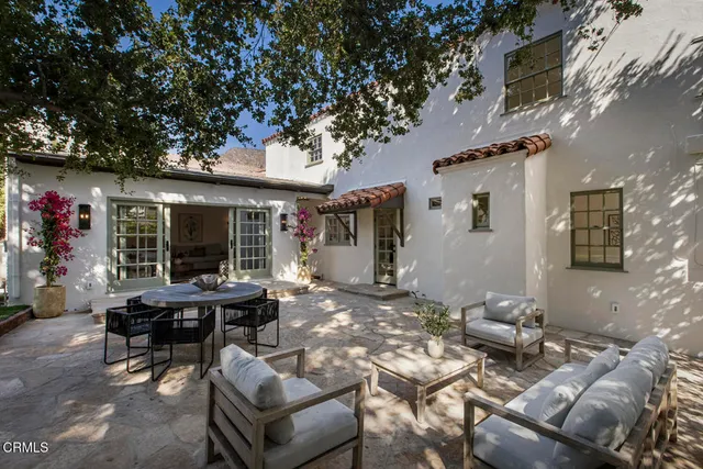 a view of backyard with green space