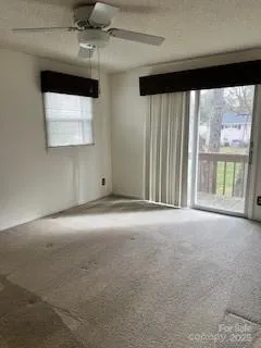 a view of a room with a large window