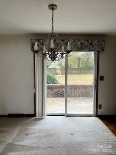 10119 Littlefield Road Charlotte, NC 28214 - Photo 5 of 8 a view of a livingroom with wooden floor and a ceiling fan