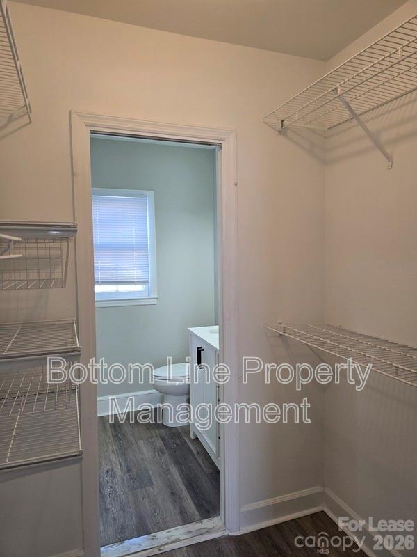 5949 Quail Hollow Road, Unit D Charlotte, NC 28210 - Photo 27 of 34 a view of a room that has a bench in it