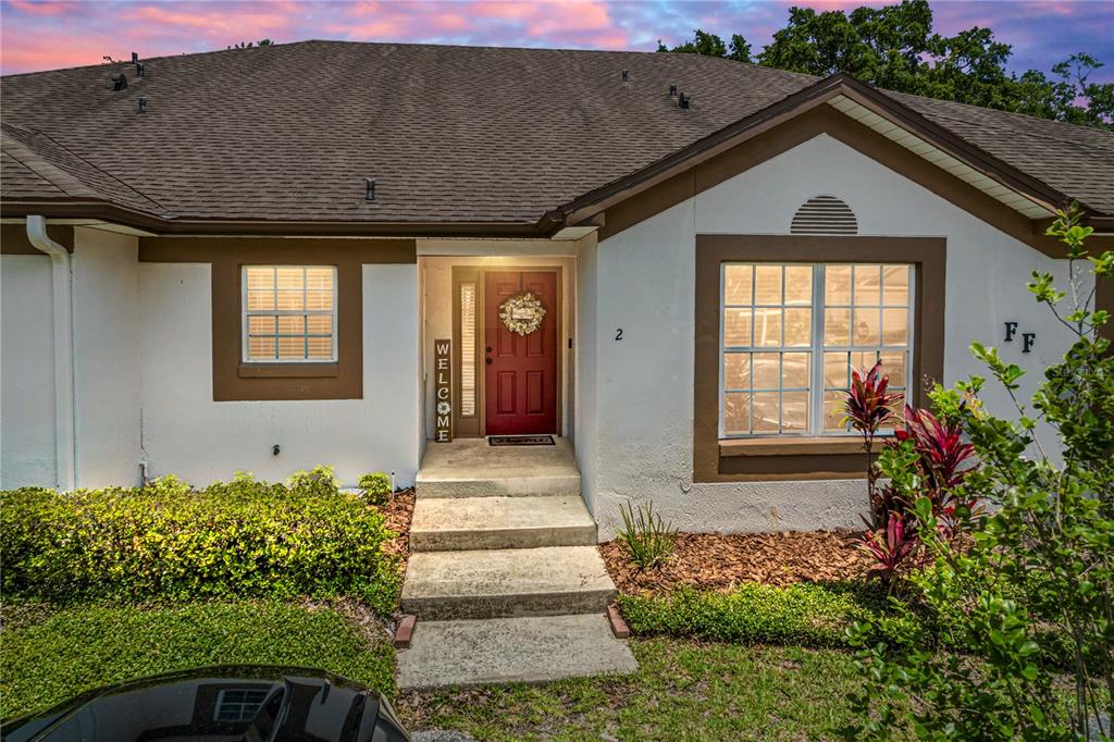 2025 Sylvester Road, Unit FF2 Lakeland, FL 33803 - Photo 1 of 1 a front view of a house with a yard