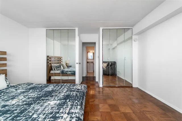 a bedroom with a bed and utility room