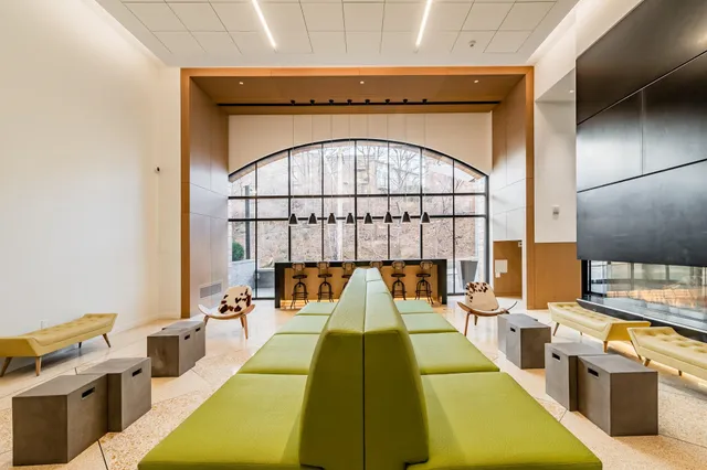 a view of swimming pool with seating area