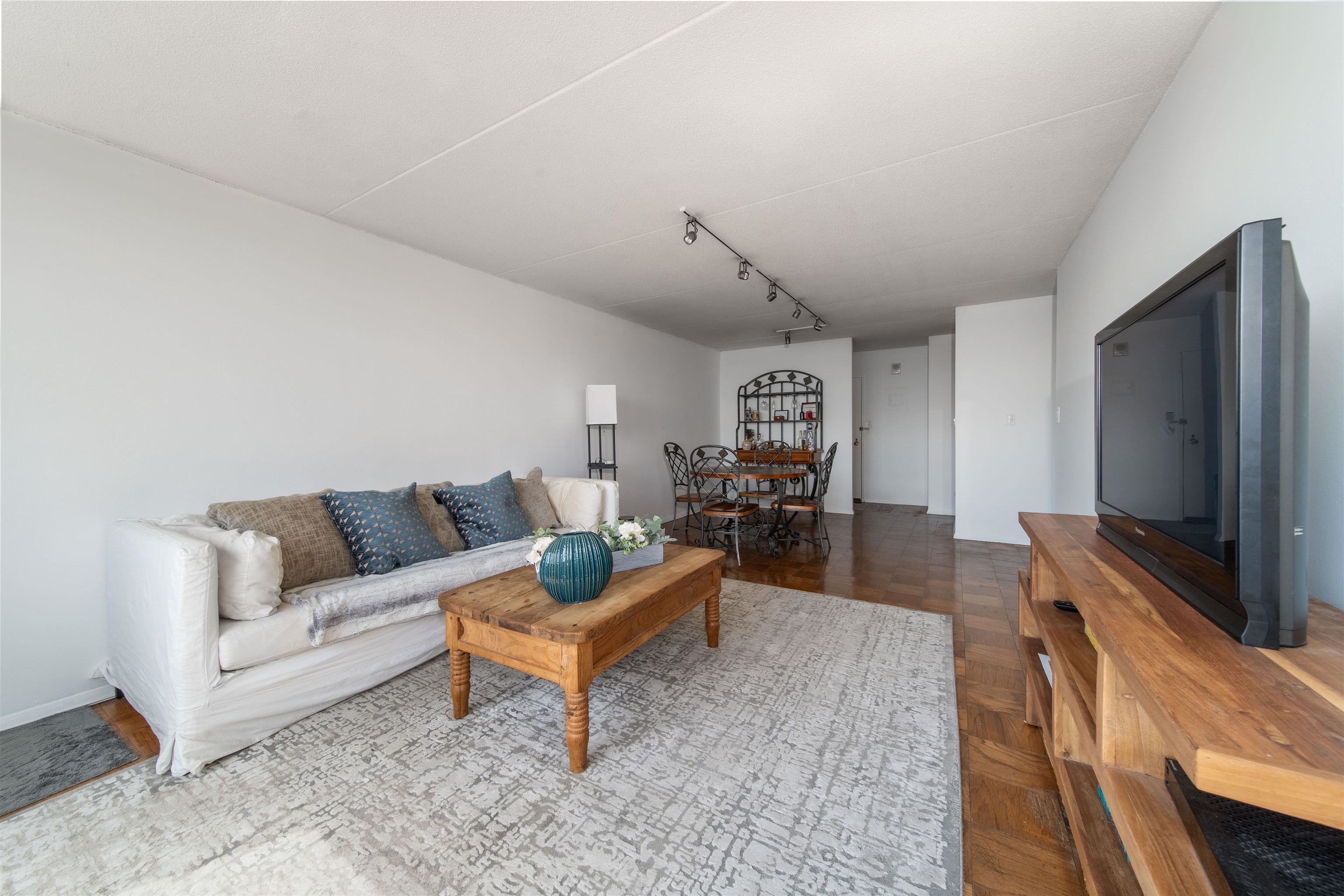 250 Gorge Road, Unit 12K Cliffside Park, NJ 07010 - Photo 9 of 18 a living room with furniture and a flat screen tv