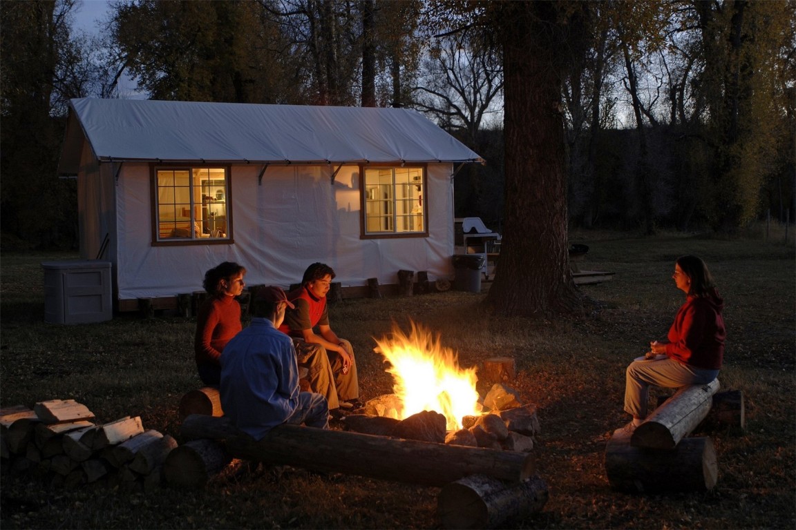 27200 Fire Song Road Steamboat Springs, CO 80487 - Photo 27 of 30 a group of people sitting in a backyard