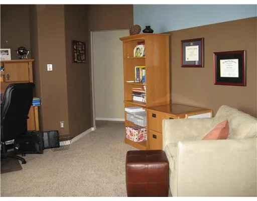 a bedroom with furniture and a bed