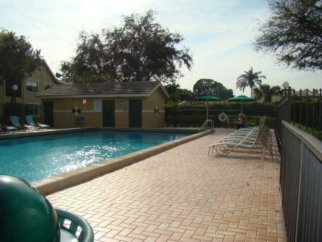 9609 Riverside Drive, Unit 9 Coral Springs, FL 33071 - Photo 15 of 15 swimming pool view with a outdoor seating