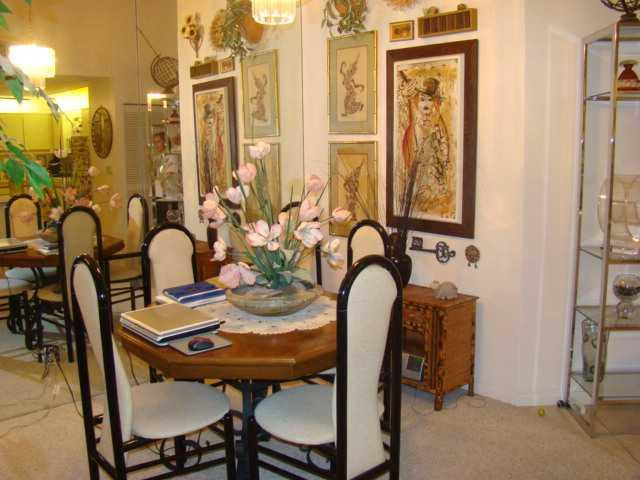 9609 Riverside Drive, Unit 9 Coral Springs, FL 33071 - Photo 3 of 15 a view of a dining room with furniture and window