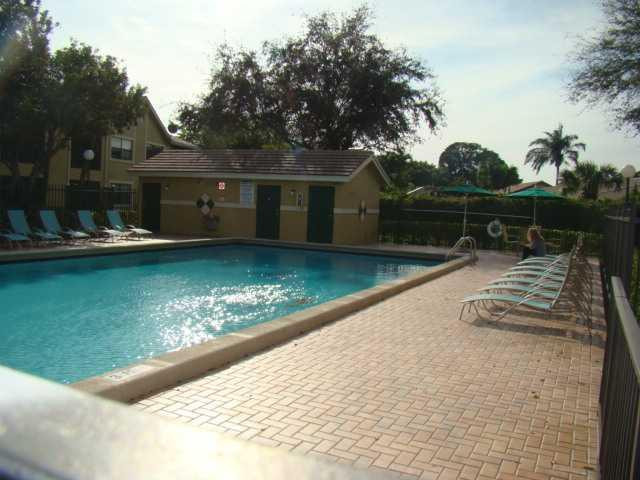 9609 Riverside Drive, Unit 9 Coral Springs, FL 33071 - Photo 8 of 15 a view of house with ocean view