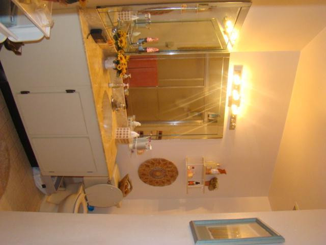 9609 Riverside Drive, Unit 9 Coral Springs, FL 33071 - Photo 10 of 15 a bathroom with a sink