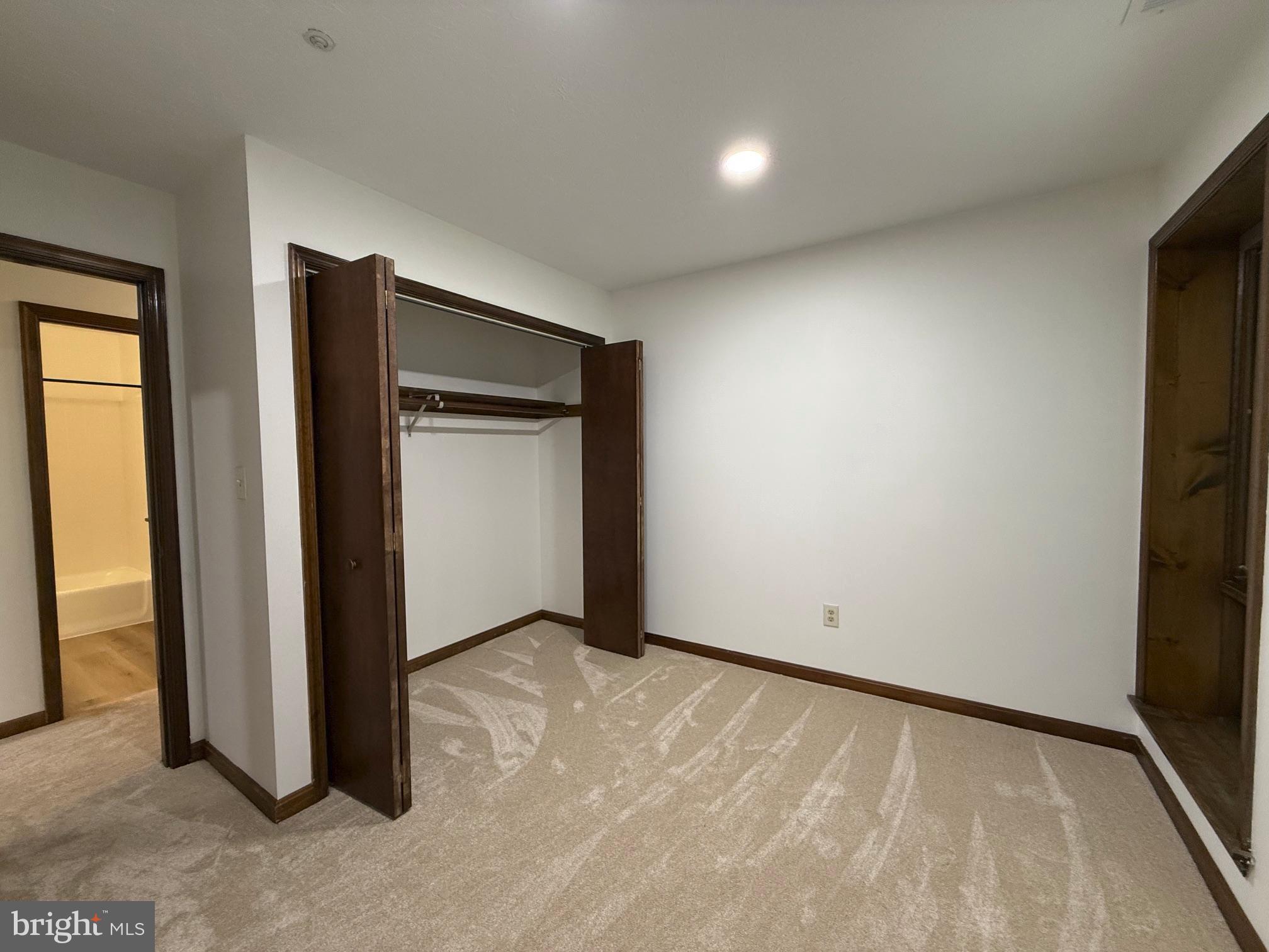 44790 Locust Ridge Court, Unit 9B California, MD 20619 - Photo 9 of 14 Bedroom one, new carpets fresh paint