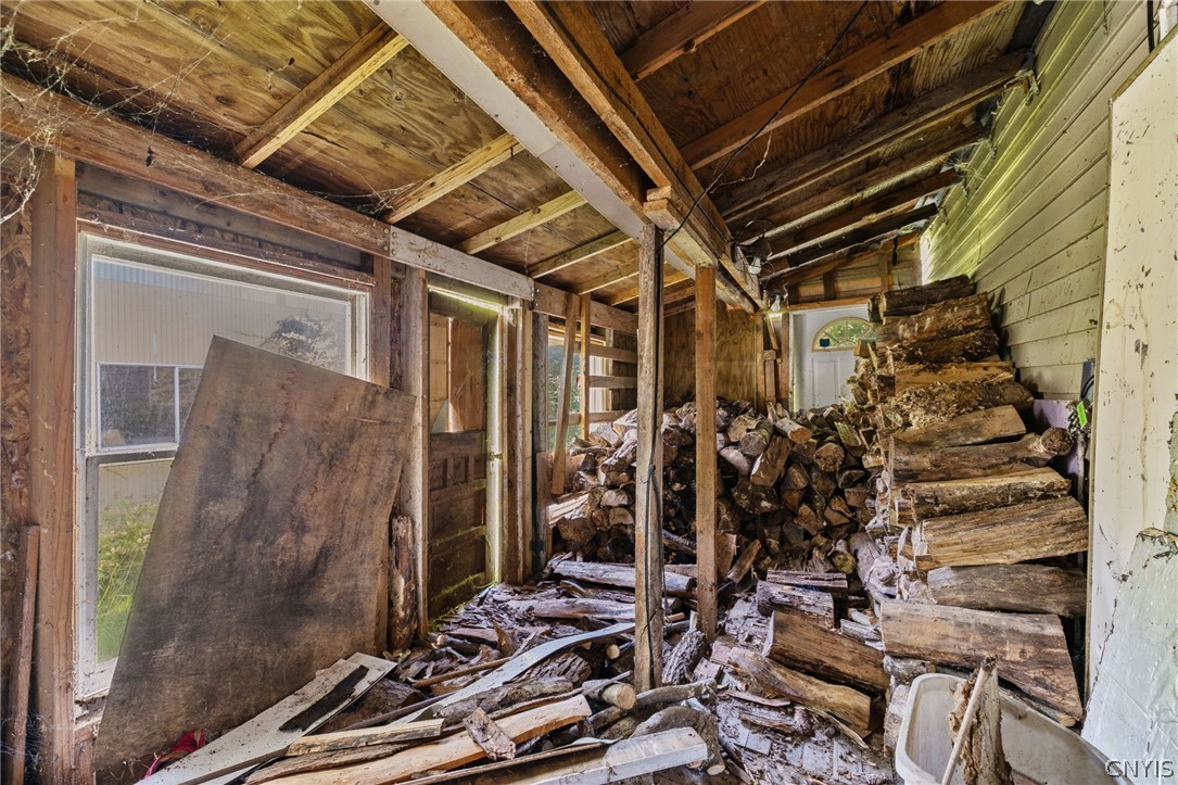 13811 Martville Road Sterling, NY 13111 - Photo 37 of 43 Wood shed off the bonus room on the side of the ho