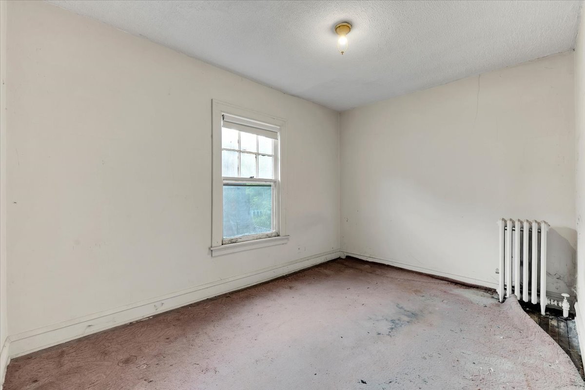 1704 West 94th Street Chicago, IL 60643 - Photo 11 of 29 an empty room with a window