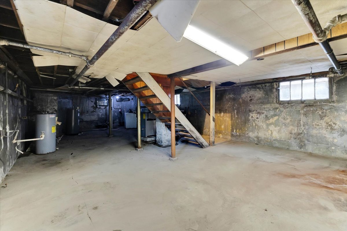 1704 West 94th Street Chicago, IL 60643 - Photo 19 of 29 a view of a storage room with stairs