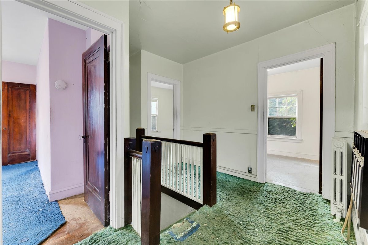 1704 West 94th Street Chicago, IL 60643 - Photo 20 of 29 a view of a hallway with a livingroom and stairs