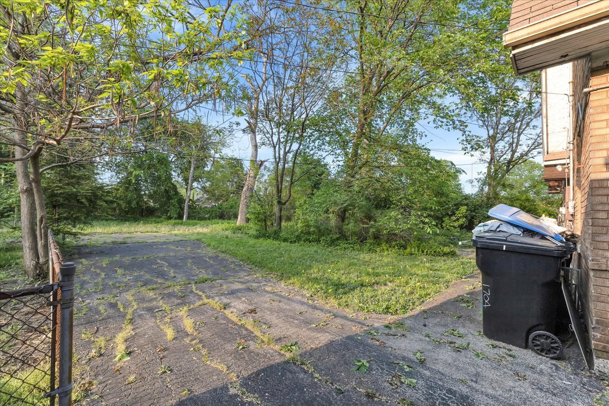 1704 West 94th Street Chicago, IL 60643 - Photo 26 of 29 a view of a backyard with sitting area