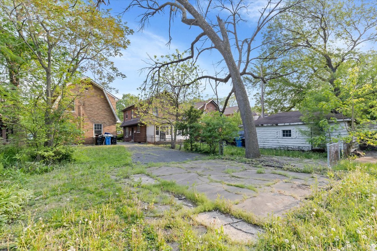 1704 West 94th Street Chicago, IL 60643 - Photo 28 of 29 a view of a house with a yard