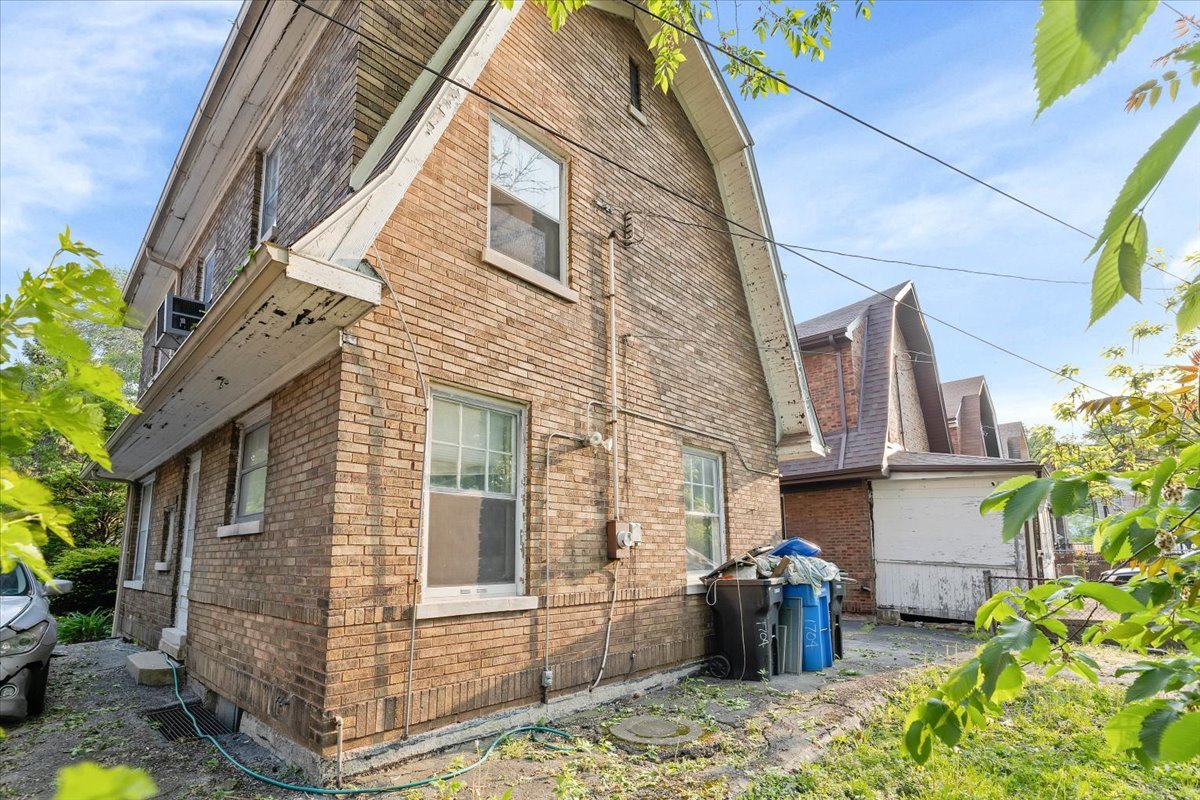1704 West 94th Street Chicago, IL 60643 - Photo 29 of 29 a view of a patio with table and chairs and potted plants