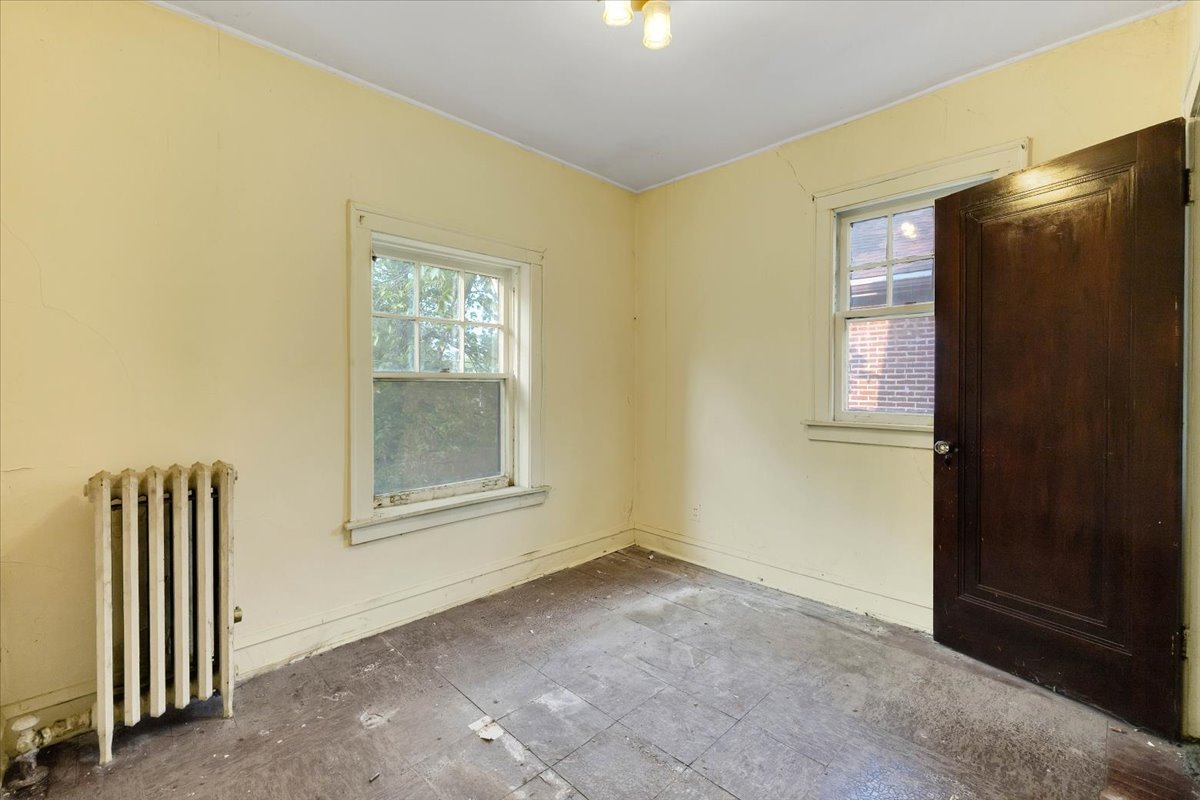 1704 West 94th Street Chicago, IL 60643 - Photo 10 of 29 a view of an empty room with a window