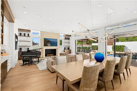 a living room with furniture and a ceiling fan