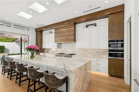 a lobby with furniture and a table