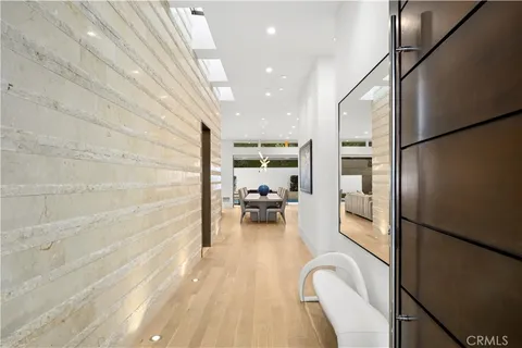 a view of a living room and a balcony