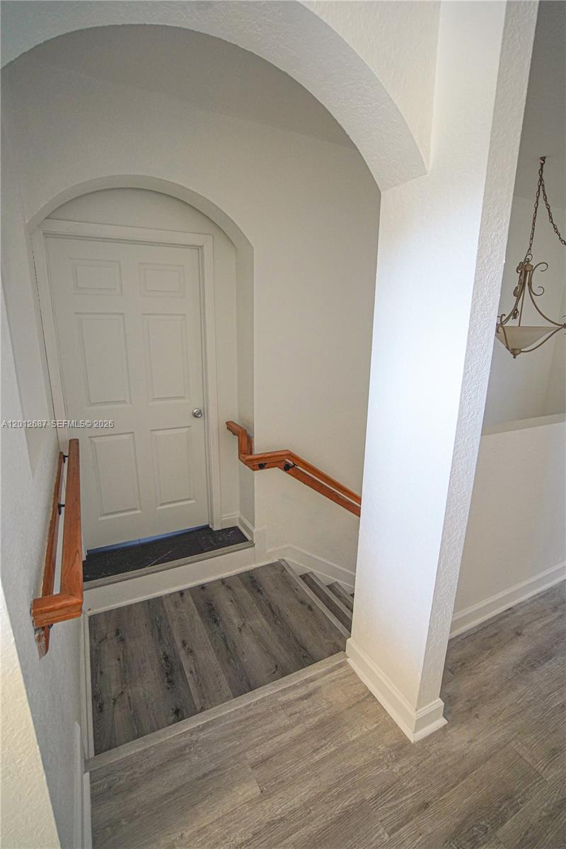 1751 Southwest 154th Path Miami, FL 33185 - Photo 31 of 41 wooden floor in an empty room