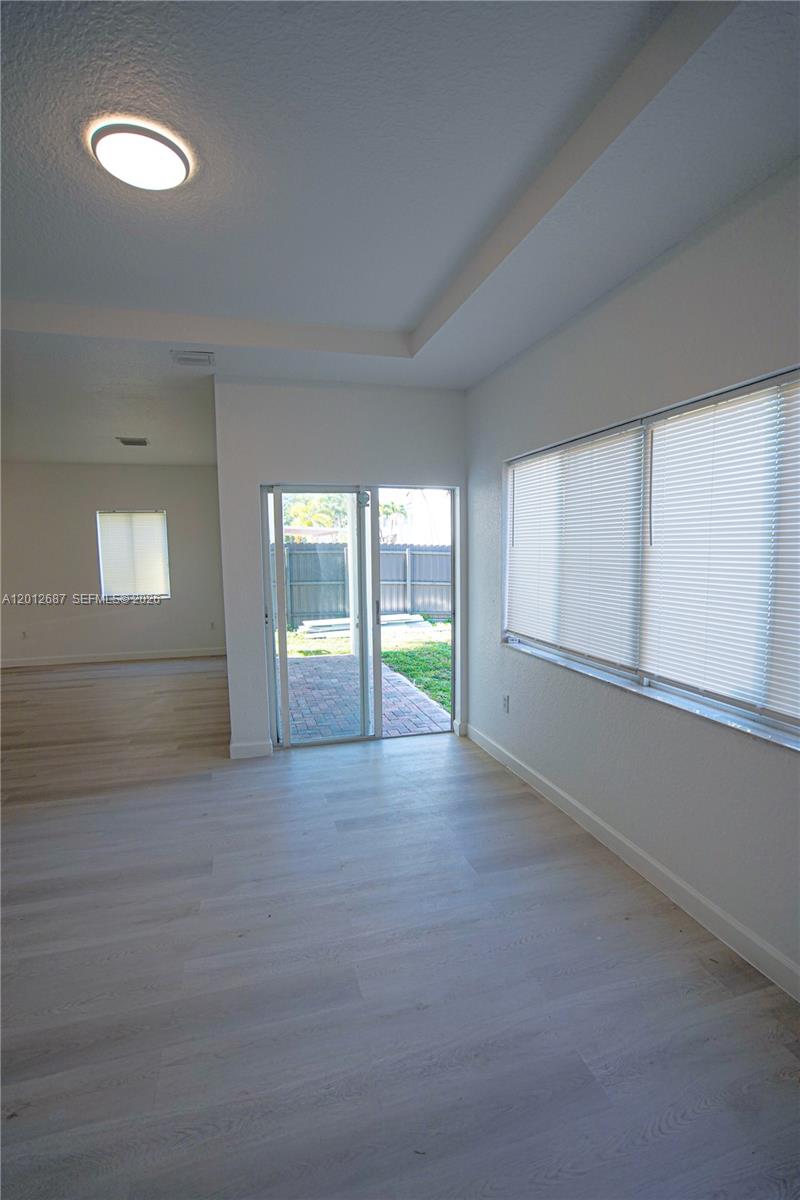 1751 Southwest 154th Path Miami, FL 33185 - Photo 36 of 41 a view of an empty room with a window