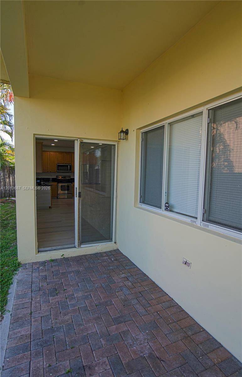 1751 Southwest 154th Path Miami, FL 33185 - Photo 37 of 41 a view of empty room with a window
